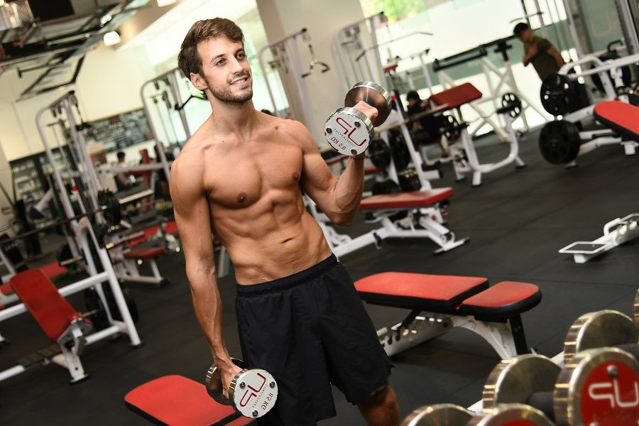  Gonzalo-in-the-gym-bicep-curl Ultimate Performance